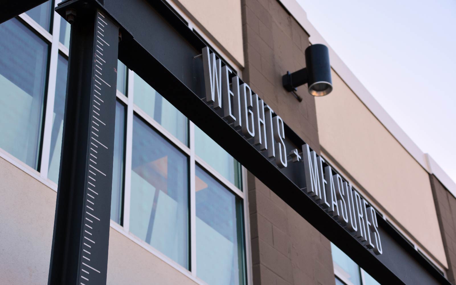 Weights & Measures signage on steel beam